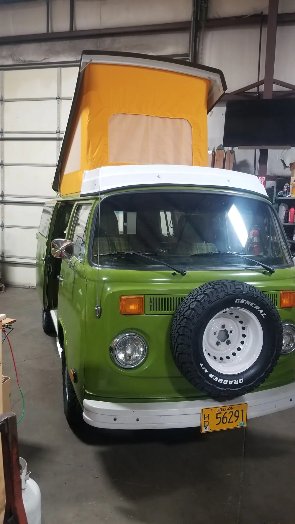 Classic Volkswagen van conversion, exterior view with pop-top camper roof