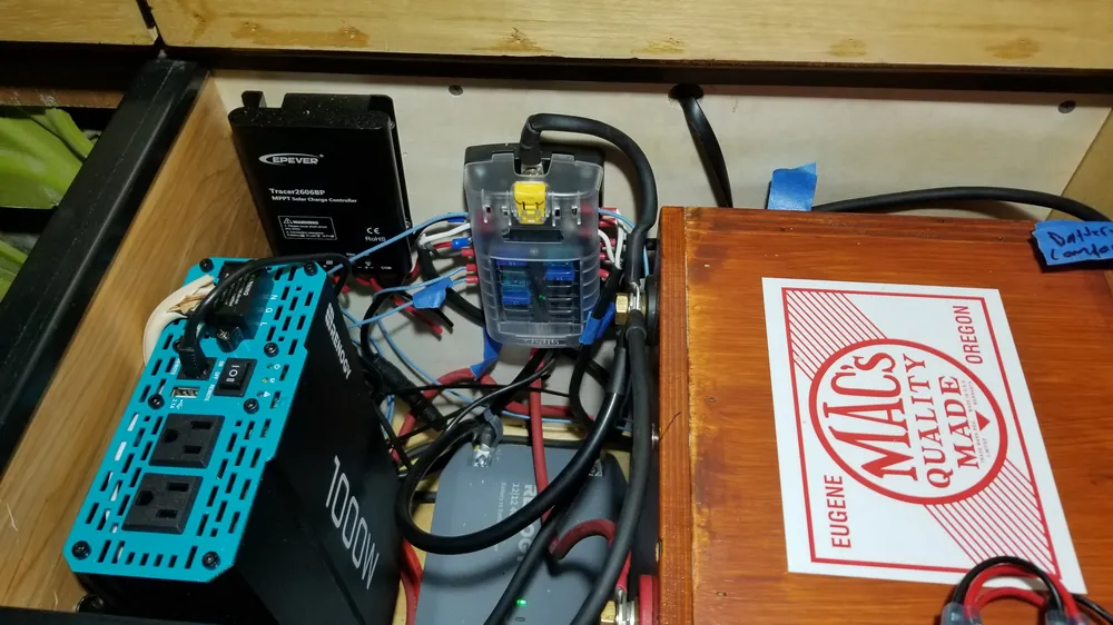 12V power system wiring in a Volkswagen van conversion with EPEVER MPPT charge controller, Renogy DC-DC charger, Renogy 1000W inverter, and Blue Sea fuse block