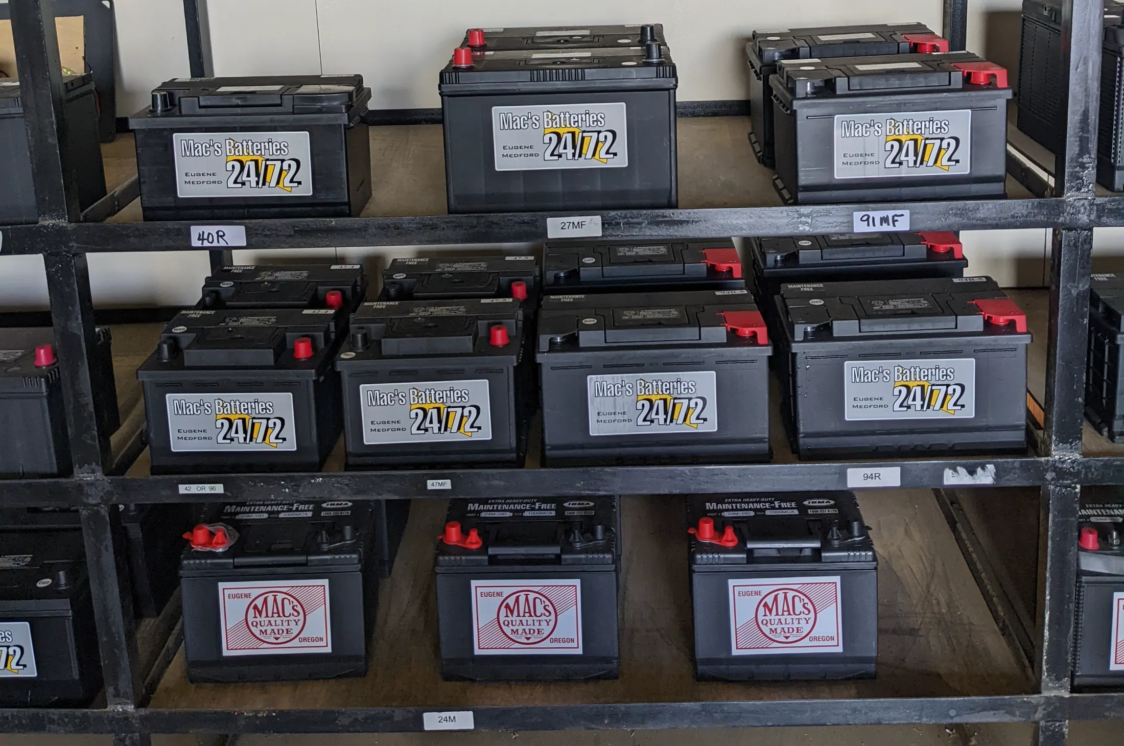 Automotive batteries on shelf